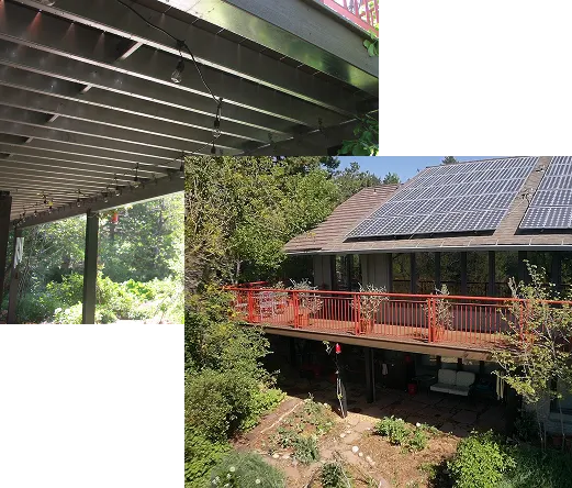 Covered deck overlooking a neighboring home with a red-railed deck
