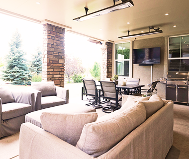 Underdeck system with outdoor lounge and fan