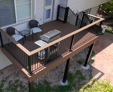 Outdoor deck built for entertaining in Boulder Colorado with open layout and pergola