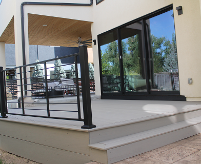 Outdoor deck built for entertaining in Boulder Colorado with open layout and pergola