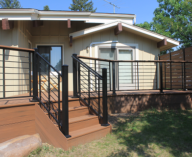 Outdoor deck built for entertaining in Boulder Colorado with open layout and pergola