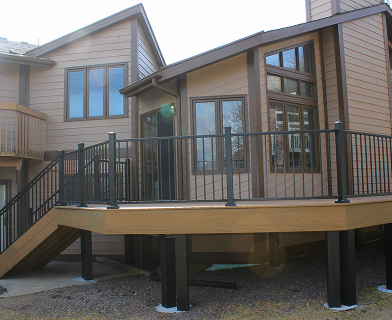 Outdoor deck built for entertaining in Boulder Colorado with open layout and pergola