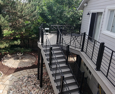 Outdoor deck built for entertaining in Boulder Colorado with open layout and pergola